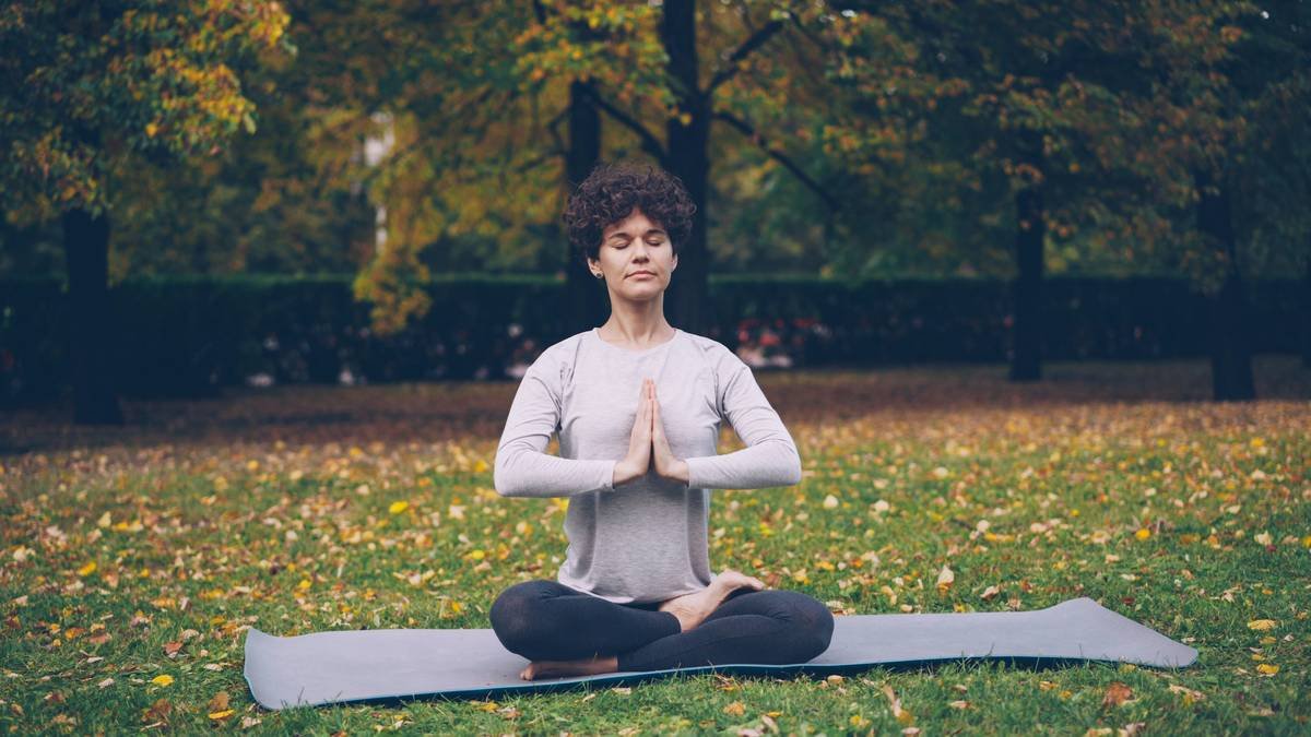 Person practicing meditation during a break at work